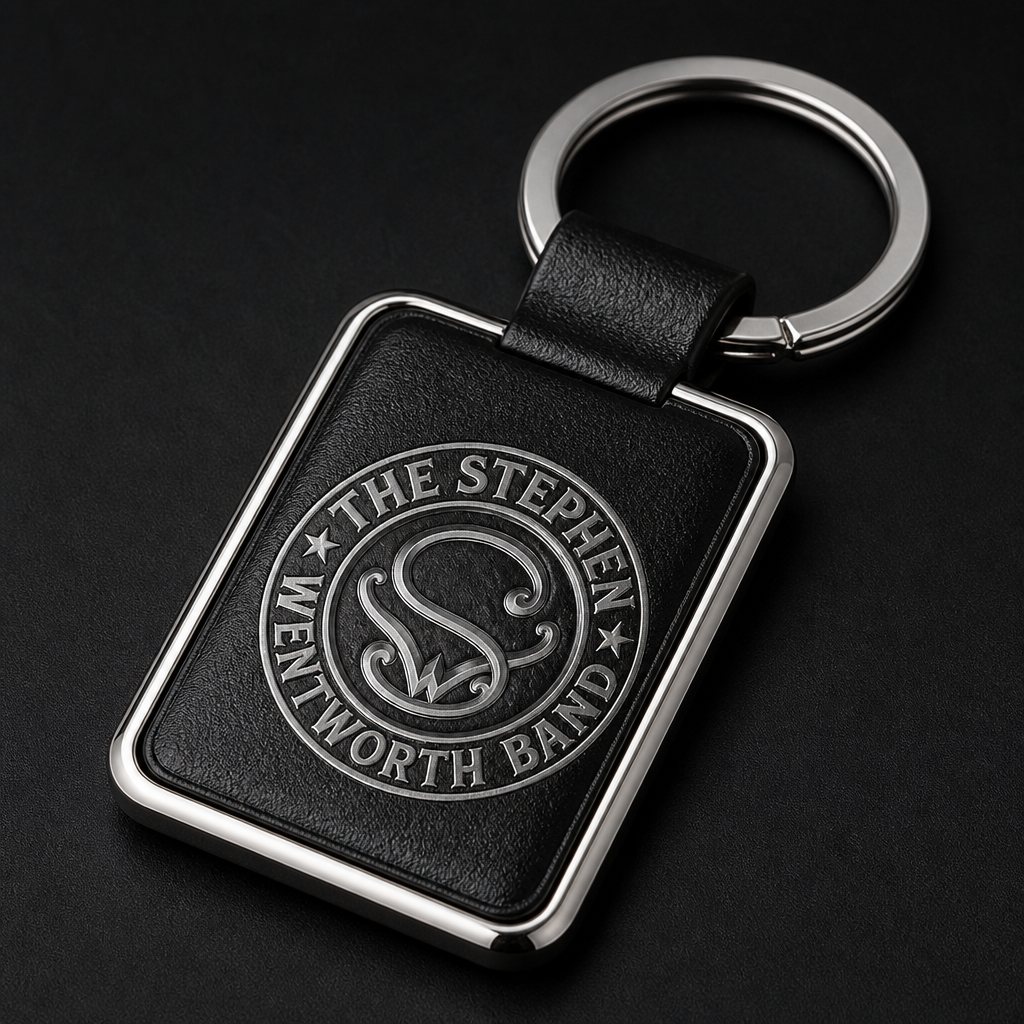 Black and silver metal-frame leatherette keychain with the band emblem